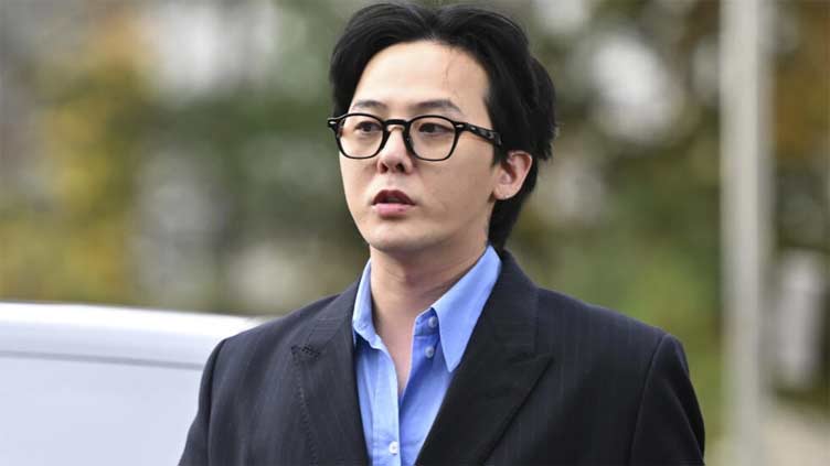 K-pop star G-Dragon appears for questioning over alleged drug use