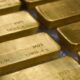 Gold clocks new record amid weakened dollar, possible end to rate hikes cycle
