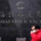 China stocks slump to near five-year low, Moody's changes outlook to negative