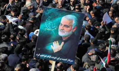 More than 100 killed in 'terrorist attacks' near tomb of Iranian Guards' Soleimani