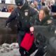 At least 212 detained across Russia at Navalny rallies, rights group says