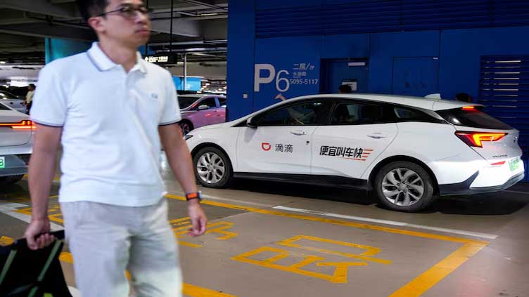 China's Didi Global falls to first quarter loss on drop in Xpeng income