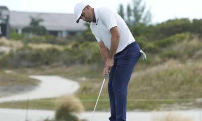 Scottie Scheffler has new putting grip and trails Cameron Young by 3 in Bahamas