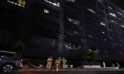 A fire and thick smoke engulfed an eight-story building in the South Korean city of Seongnam on Friday, sending 12 people to hospital with smoke inhalation, and about 30 people who had been trapped were safely rescued, the fire department said. The department deployed 82 vehicles and equipment south of Seoul to bring the blaze under control after the fire started in a restaurant on the ground floor of the busy commercial building, which also housed a swimming pool where children take lessons. Earlier, YTN television reported multiple people were trapped inside, with footage showing black smoke engulfing a large part of the building.